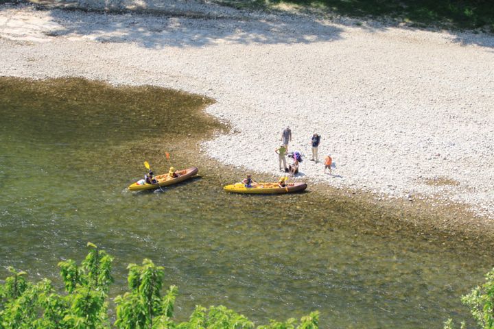 Canoes at the beach at Pont d’Arc in the Gorges de l’Ardèche,