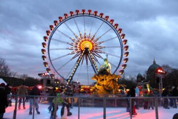 Ferris Wheel in Berlin -- it is at the center of the Christmas market in front of the red town hall.