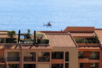Helicopter landing at Monaco Heliport MCM from Côte d'Azur Airport