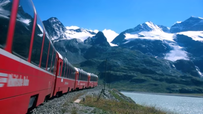 Bernina Express - Bernina Express in front of the mountain Cambrena. Bernina Express