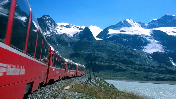Bernina Express - Bernina Express in front of the mountain Cambrena. Bernina Express