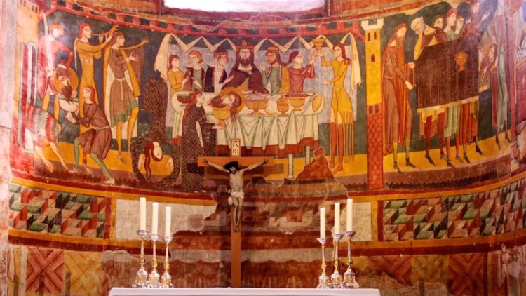Romanesque fresco of the martyrdom of St John the Baptist in Müstair