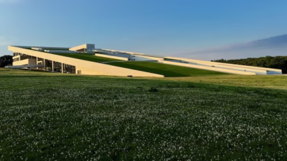 Grass-covered sloping roof of the Moesgaard Museum near Aarhus