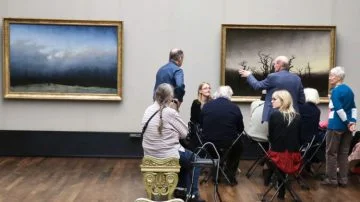 The two most famous Caspar David Friedrich paintings in the Alte Nationalgalerie in Berlin hang side-by-side: "Mönch am Meer" (Monk by the Sea) and "Abtei im Eichwald" (Abbey Among Oak Trees).
