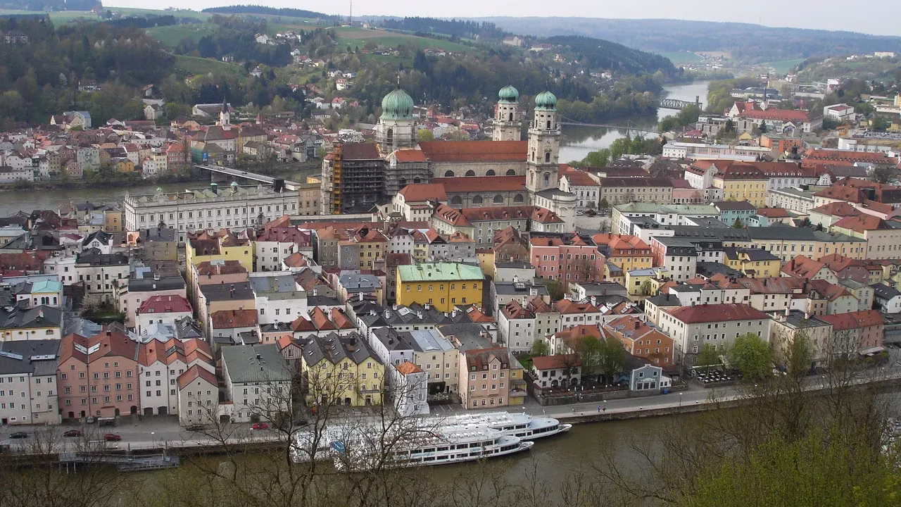 Passau Cathedral and cruise boat