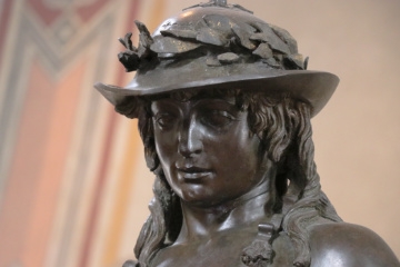 Close up of the face of Donatello's Bronze David (1440) in the Bargello