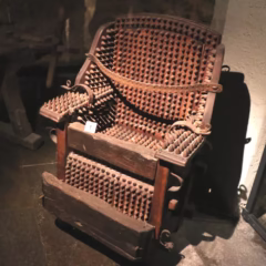 Spiky Torture Chair  in the Medieval Crime (Torture) Museum in Rothenburg ob der Tauber.
