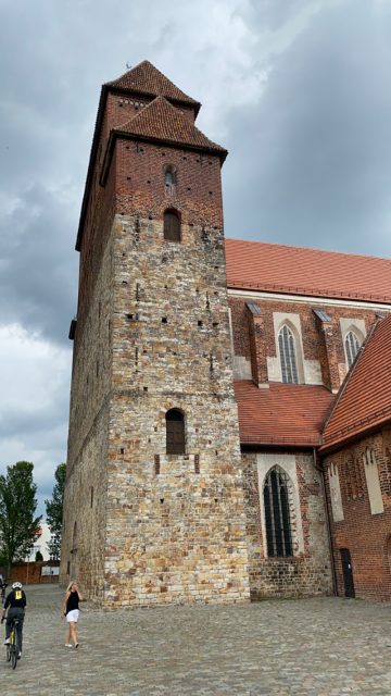 Westwerk of Havelberg Cathedral with cyclist