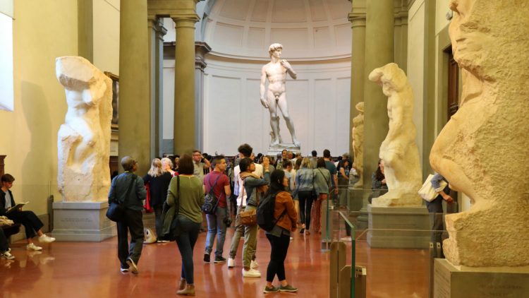 Michelangelo’s David sculpture in the Accademia in Florence is best seen on timed reservation tickets with fast-track priority admissions for a specific time slot. Prisoners and David by Michelangelo