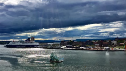 DFDS Copenhagen to Oslo Ferry boat seen from the Oslo Opera House.