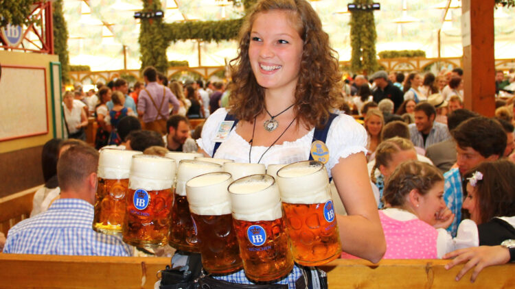 Beers are served by the Mass at Oktoberfest in Munich