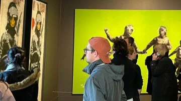Many visitors buy skip-the-line tickets online to visit the MOCO Amsterdam Modern and Contemporary Art Museum to see the Banksy Exhibition and other street artists on Museumplein.