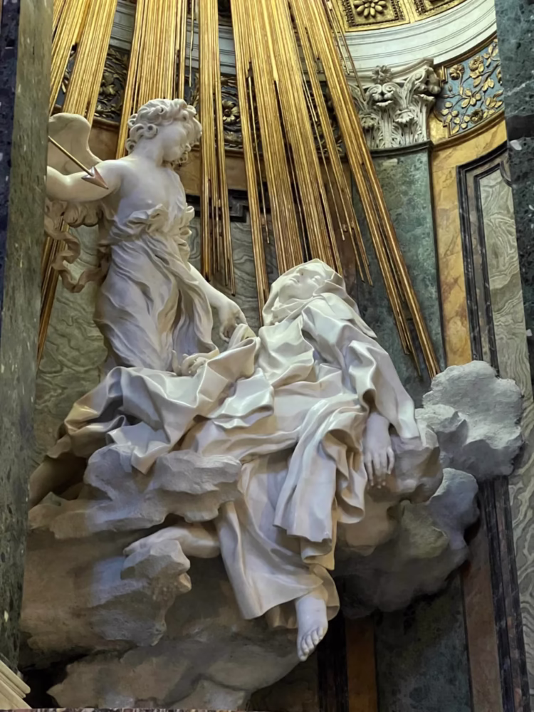 Bernini's daring Ecstasy of Saint Teresa in the Santa Maria della Vittoria Church in Rome is one of the best Baroque marble sculptures ever.