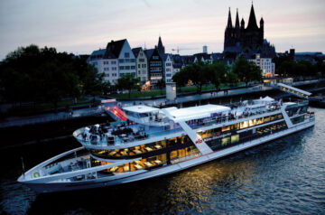 KD MS Rheinfantasie at night on the Rhine River in Cologne