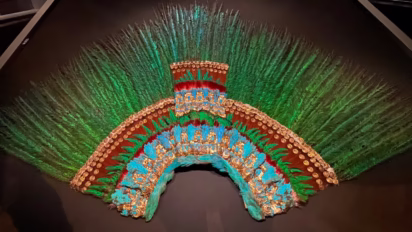 The most famous item on display in the Weltmuseum Wien (World Museum Vienna) is the Aztec quetzal feather headdress often referred to as the Penacho de Moctezuma.