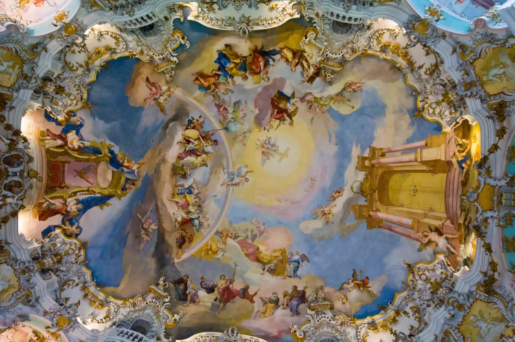 World heritage wall and ceiling frescoes of Wieskirche church in Bavaria, Germany, and a popular stop on the Romantic Road Romantische Straße