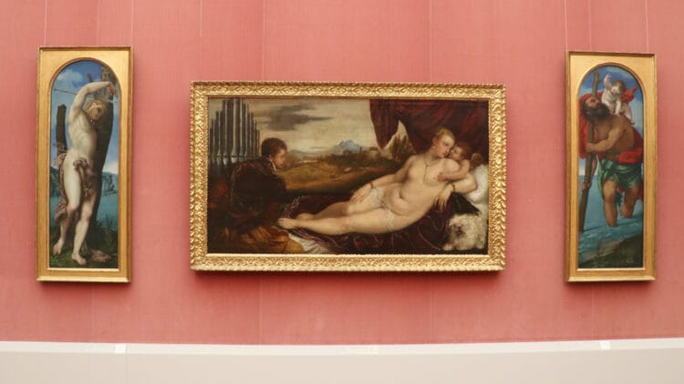 Titian's Venus with the Organ Player flanked by Lorenzo Lotto's St Sebastian and St Christopher in the Gemäldegalerie