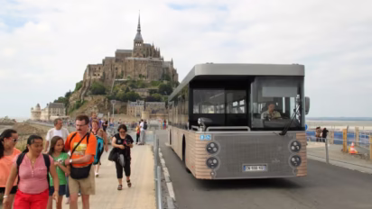 Bus transportation and walking from Mont St Michel to the Parking Area