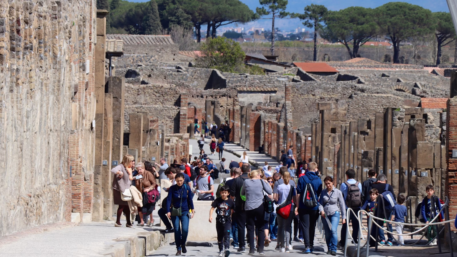 Visit Pompeii early in the morning, buy skip-the-line tickets online with time-slot reservations, or book guided tours to avoid queues when visiting the hugely popular archaeological excavations park and historical sites near Naples in Italy.