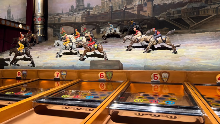 Horse racing game in the Museum of Fairground Arts (Musée des Arts Forains) in Paris, Bercy.